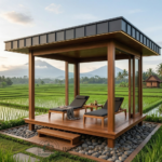 Wooden gazebo with two chaise lounges on a raised deck overlooking terraced rice fields.