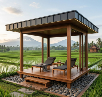 Wooden gazebo with two chaise lounges on a raised deck overlooking terraced rice fields.